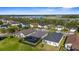A residential neighborhood with backyard pools and lush green spaces at 12565 Ryegrass Loop, Parrish, FL 34219