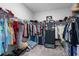 Spacious walk-in closet with ample shelving and storage for organizing clothing and accessories at 12565 Ryegrass Loop, Parrish, FL 34219