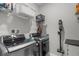 Well-equipped laundry room with modern washer and dryer, plus convenient storage solutions at 12565 Ryegrass Loop, Parrish, FL 34219