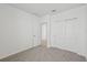 A bright, carpeted bedroom with a closet and ensuite entrance at 14061 Crutchfield Ct, Parrish, FL 34219