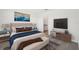 A luxurious main bedroom boasting elegant decor, a king bed, and ample natural light at 14061 Crutchfield Ct, Parrish, FL 34219
