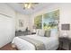 Bright bedroom with large windows providing natural light and hardwood flooring at 14230 Cattle Egret Pl, Lakewood Ranch, FL 34202