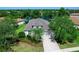 Charming single-Gathering home with a well-maintained lawn and mature trees in a quiet neighborhood at 14230 Cattle Egret Pl, Lakewood Ranch, FL 34202