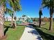 Community playground surrounded by lush landscaping, offering a safe and fun environment for to play at 16711 Rivers Reach Blvd, Parrish, FL 34219
