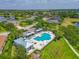 Aerial view of a community pool and lounge area, perfect for relaxation and social gatherings at 16711 Rivers Reach Blvd, Parrish, FL 34219