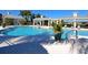 Resort-style swimming pool with a covered lounge area, perfect for relaxation and community enjoyment at 16711 Rivers Reach Blvd, Parrish, FL 34219