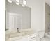 Neutral bathroom with a mirror and a view into the shower at 16849 Castoro Dr, Port Charlotte, FL 33953