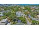 Aerial image features a neighborhood property with mature trees, and contemporary houses in an urban setting at 1742 9Th St, Sarasota, FL 34236