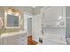 Bathroom with vanity and stacked washer dryer at 1742 9Th St, Sarasota, FL 34236