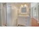 Bathroom featuring a vanity with drawers and a walk-in shower at 1742 9Th St, Sarasota, FL 34236