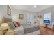 Bedroom with a bed, french doors, and a seating area at 1742 9Th St, Sarasota, FL 34236