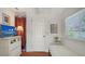 Bedroom with daybed, dresser, TV, and view to exterior at 1742 9Th St, Sarasota, FL 34236