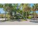 Charming home with mature trees, a manicured lawn, and a classic design, creating a welcoming curb appeal at 1742 9Th St, Sarasota, FL 34236