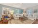 Comfortable living room with hardwood floors and plush seating, a cozy retreat for relaxation and entertainment at 1742 9Th St, Sarasota, FL 34236