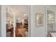 Inviting living room featuring hardwood floors and an open doorway, connecting spaces for seamless entertaining at 1742 9Th St, Sarasota, FL 34236