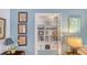 Stylish built-in shelving unit displaying decorative items and vintage artwork at 1742 9Th St, Sarasota, FL 34236