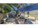 Enjoy outdoor entertaining with comfortable seating and lush landscaping near the home at 1742 9Th St, Sarasota, FL 34236
