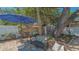 Entertaining area with a table and comfortable seating, ideal for enjoying outdoor gatherings at 1742 9Th St, Sarasota, FL 34236