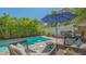 Enjoy the pool and patio area complete with seating for outdoor entertaining and relaxation at 1742 9Th St, Sarasota, FL 34236