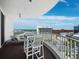 Balcony with lounge chair and a city view at 1771 Ringling Blvd # 1104, Sarasota, FL 34236