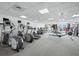 Well-equipped gym with cardio machines, free weights, and a view of the beach at 1771 Ringling Blvd # 1104, Sarasota, FL 34236
