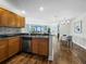 Updated kitchen with sleek appliances and a seamless flow to living area at 1771 Ringling Blvd # 1104, Sarasota, FL 34236