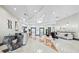 Modern lobby area featuring a stylish front desk, seating, and marble flooring at 1771 Ringling Blvd # 1104, Sarasota, FL 34236