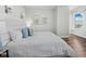 Well-lit main bedroom featuring comfortable king-size bed and bright decor at 1771 Ringling Blvd # 1104, Sarasota, FL 34236