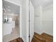 View of spacious walk-in closet leading to the bathroom and shower at 1771 Ringling Blvd # 1104, Sarasota, FL 34236