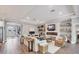 Bright and airy living room featuring fireplace, built-in shelves, and stylish decor at 18045 Polo Trail St, Bradenton, FL 34211