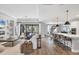 Spacious open-concept living area with stylish decor, modern furniture, and natural light at 18045 Polo Trail St, Bradenton, FL 34211