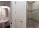 Well lit bathroom featuring a pedestal sink and a glass shower at 19208 Ganton Ave, Lakewood Ranch, FL 34202