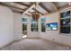 Bright bedroom featuring a decorative ceiling and outdoor access at 19208 Ganton Ave, Lakewood Ranch, FL 34202