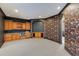 Large bonus room with custom cabinets, and unique wallpaper at 19208 Ganton Ave, Lakewood Ranch, FL 34202