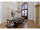 Formal dining room with high ceilings, elegant chandelier, and a large window at 19208 Ganton Ave, Lakewood Ranch, FL 34202