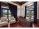 Well-appointed office featuring rich wood accents, a large desk, and comfortable seating for productivity and style at 19208 Ganton Ave, Lakewood Ranch, FL 34202