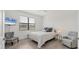 Cozy bedroom with a TV and view to the outside at 2072 Mackerel St, Port Charlotte, FL 33953