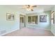 Bright bedroom with large bay window providing ample natural light and closet with mirrored sliding doors at 222 High Point Dr, Venice, FL 34292