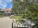 Lush grounds surround this charming house with mature trees and open space at 222 High Point Dr, Venice, FL 34292