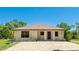 A well-maintained home with brick driveway and verdant landscaping at 222 High Point Dr, Venice, FL 34292