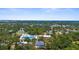 An aerial view of a neighborhood pool area in a lush, green neighborhood at 2632 Hawthorne St, Sarasota, FL 34239