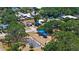 A charming playground with play equipment is nestled among the beautiful trees at 2632 Hawthorne St, Sarasota, FL 34239