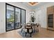 This dining room features an elegant chandelier and sliding doors to the patio at 2632 Hawthorne St, Sarasota, FL 34239