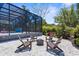 Relaxing outdoor space with fire pit surrounded by Adirondack chairs at 2632 Hawthorne St, Sarasota, FL 34239