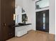 Bright foyer featuring a stylish console table, modern decor, and an inviting entrance at 2632 Hawthorne St, Sarasota, FL 34239