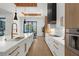 Bright, contemporary kitchen with oversized island and stainless steel oven at 2632 Hawthorne St, Sarasota, FL 34239