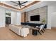 Bright living room with ceiling detail, built-in cabinets, and modern furniture at 2632 Hawthorne St, Sarasota, FL 34239