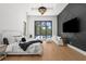 Luxurious bedroom with king bed, modern decor, and a view of the pool area at 2632 Hawthorne St, Sarasota, FL 34239