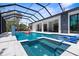 This luxurious pool features a hot tub, in-pool seating, and a relaxing spa at 2632 Hawthorne St, Sarasota, FL 34239