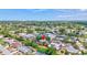 Inviting single-Gathering home featuring lush, mature landscaping and a serene, fenced backyard at 3036 Rose St, Sarasota, FL 34239